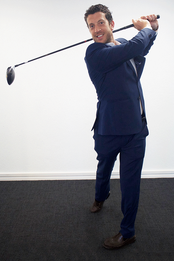 Man playing golf